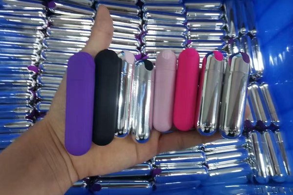 Molded adult toy components in different materials and colors