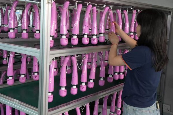 Rechargeable adult toys undergoing charging and aging tests