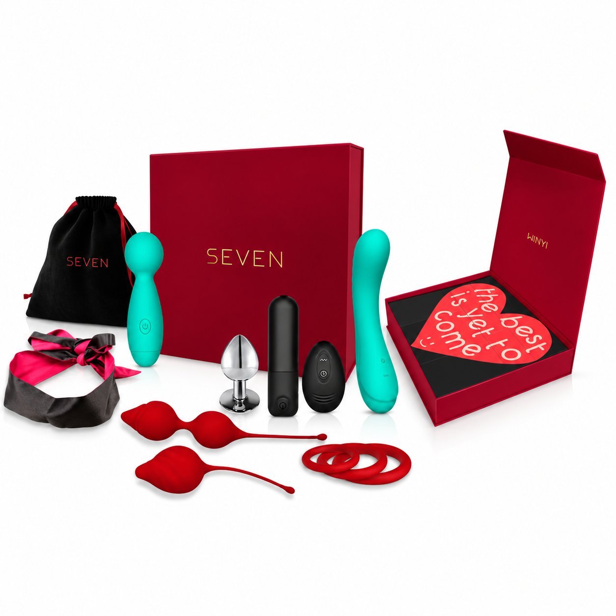 SEVEN SET red gift box with five products laid out, including a teal wand massager, black bullet, red velvet blindfold, red heart-shaped anal toys, red silicone cock rings, a black SEVEN-branded storage bag, and a teal heart card reading Best is yet to come