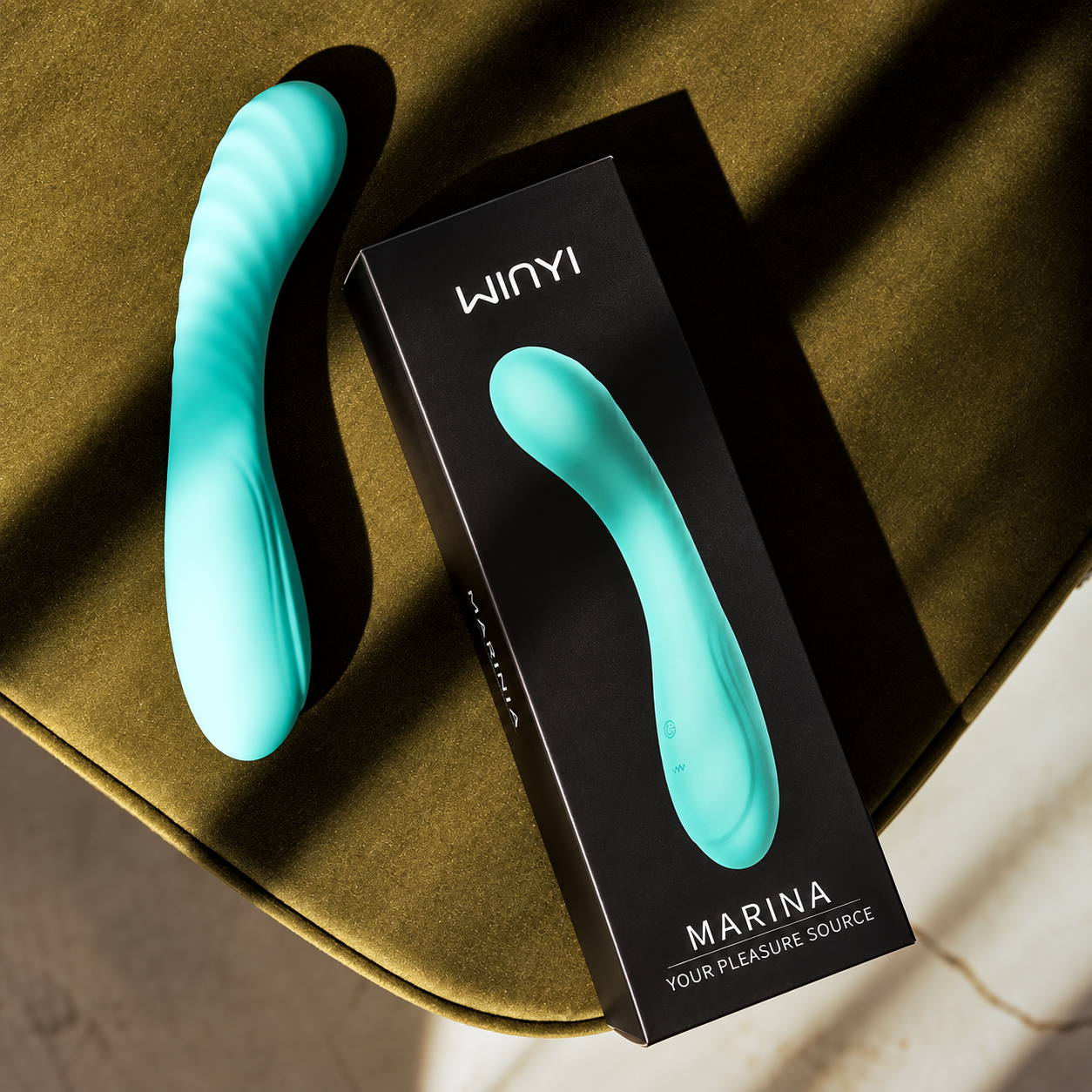 MARINA WY0524 turquoise G-spot wand beside black WINYI product packaging