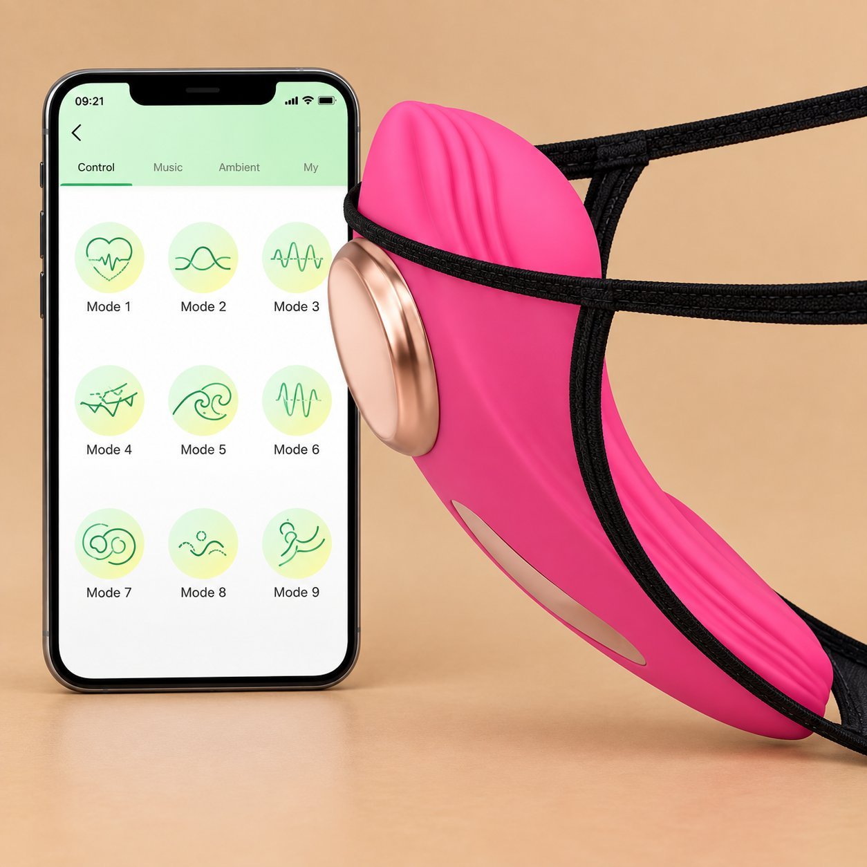 Pink wearable panty vibrator with smartphone showing app control modes Pink wearable panty vibrator beside a smartphone running the brand app showing the Control, Music, Ambient and My tabs with mode icons