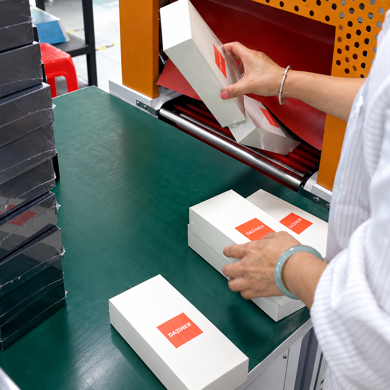 Private-label packaging boxes moving through the WINYI production line